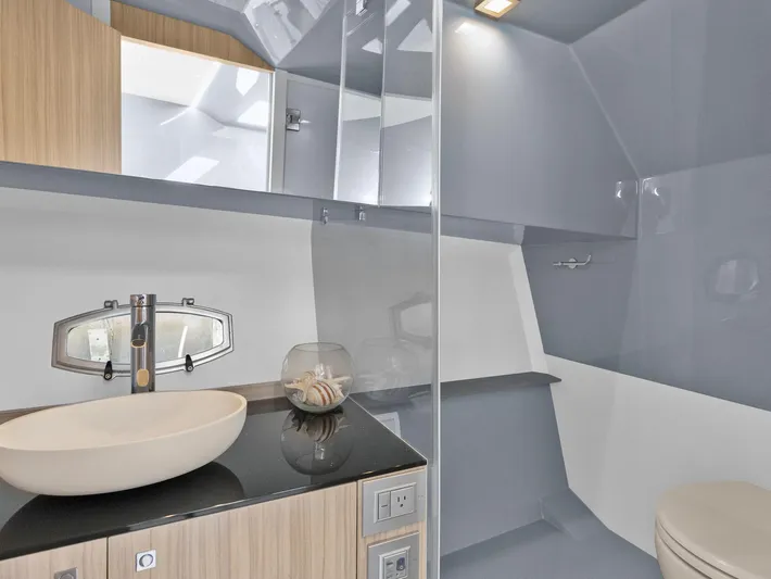  Yacht Photos Pics Luxurious bathroom in 2024 Rio Yachts Daytona 35, featuring modern fixtures and elegant design.