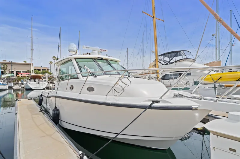  Yacht Photos Pics 2017 Boston Whaler 345 Conquest Pilothouse docked at marina.