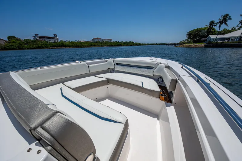 Let It Ride Yacht Photos Pics 2024 Tiara Yachts 38 LS boat interior with luxurious seating on a sunny day.