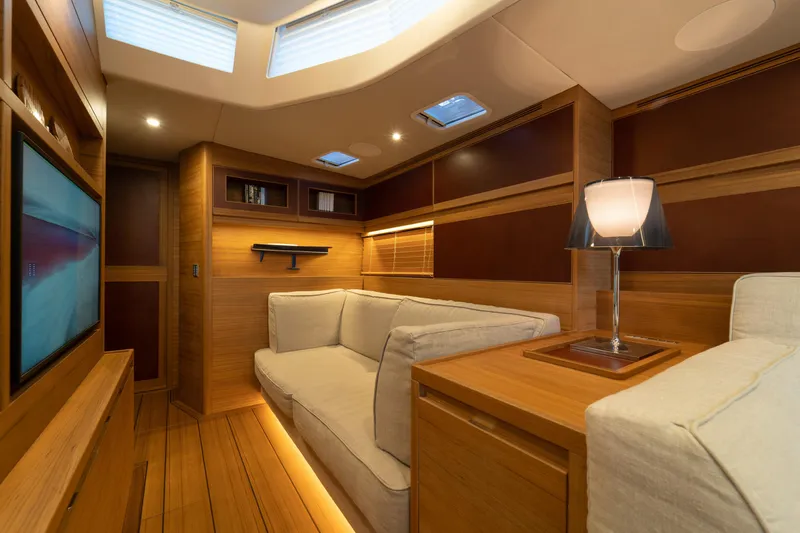  Yacht Photos Pics Luxurious interior of 2026 Ice Yachts 70, featuring elegant wood finishes and modern lighting.