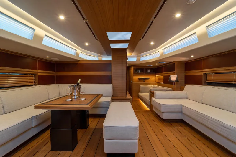  Yacht Photos Pics Luxurious interior of 2026 Ice Yachts 70, featuring elegant wood finishes and plush seating.