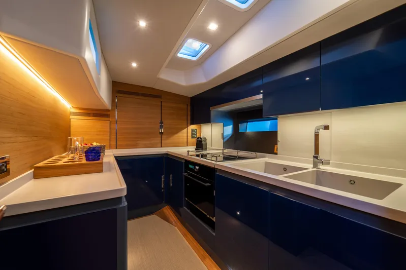  Yacht Photos Pics Luxurious kitchen interior of 2026 Ice Yachts 70, featuring modern design and sleek finishes.