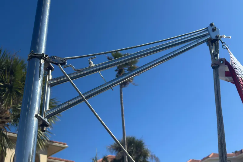 Wayward Sun Yacht Photos Pics Rigging of a 2000 Lagoon 380 sailboat against a clear blue sky.