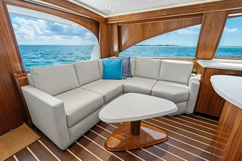 Galati Yacht Sales Trade Yacht Photos Pics Luxurious interior of 2025 Viking 58 Convertible yacht with ocean view.