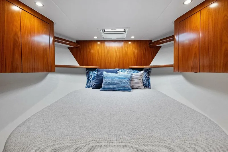 Galati Yacht Sales Trade Yacht Photos Pics Luxurious cabin interior of 2025 Viking 58 Convertible yacht with elegant wood finish.