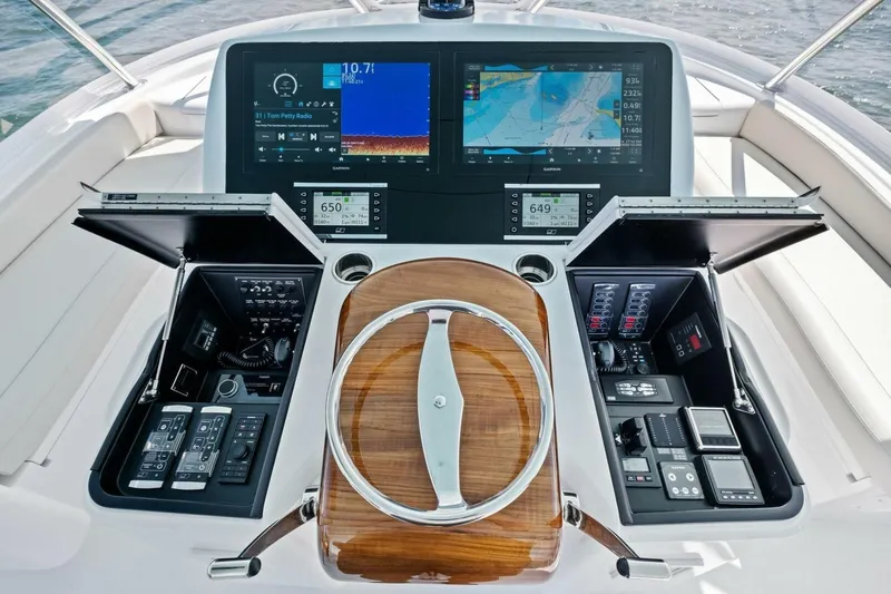 Galati Yacht Sales Trade Yacht Photos Pics 2025 Viking 58 Convertible yacht helm with advanced navigation and control systems.