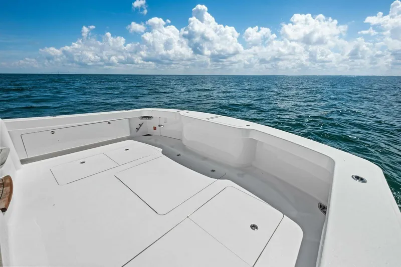 Galati Yacht Sales Trade Yacht Photos Pics 2025 Viking 58 Convertible yacht deck with ocean view under blue sky.