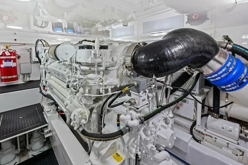 Galati Yacht Sales Trade Yacht Photos Pics Engine room of 2025 Viking 58 Convertible yacht, showcasing advanced machinery and equipment.