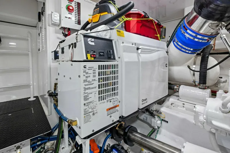 Galati Yacht Sales Trade Yacht Photos Pics Engine room of 2025 Viking 58 Convertible yacht with Onan Marine generator.