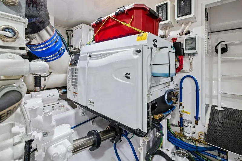 Galati Yacht Sales Trade Yacht Photos Pics Engine room of 2025 Viking 58 Convertible yacht with Onan marine generator.