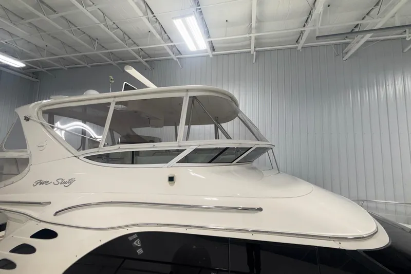  Yacht Photos Pics 2001 Sea Ray 560 Sedan Bridge yacht in indoor storage facility.