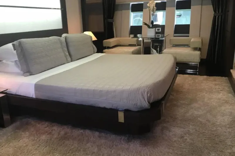  Yacht Photos Pics Luxurious bedroom interior on 2010 Azimut 103S yacht with modern decor and plush bedding.