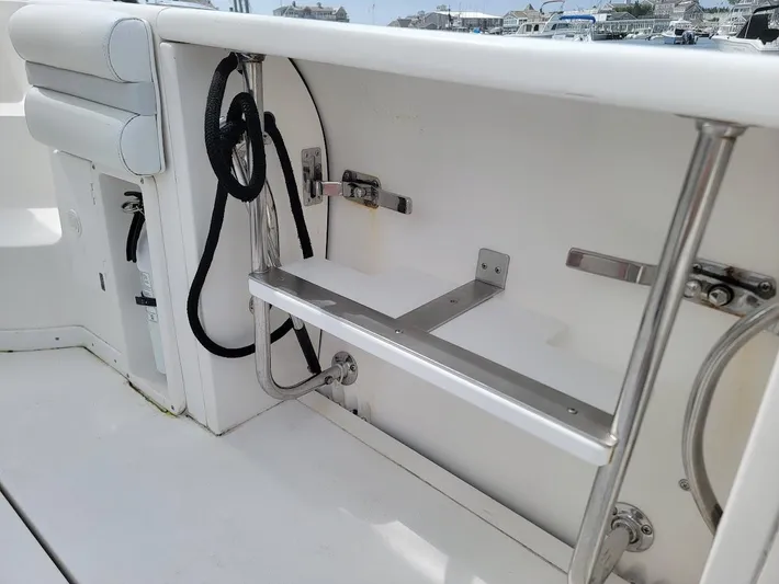  Yacht Photos Pics Interior view of a 2010 Intrepid 39 Kevlar Hull yacht, featuring a storage compartment.