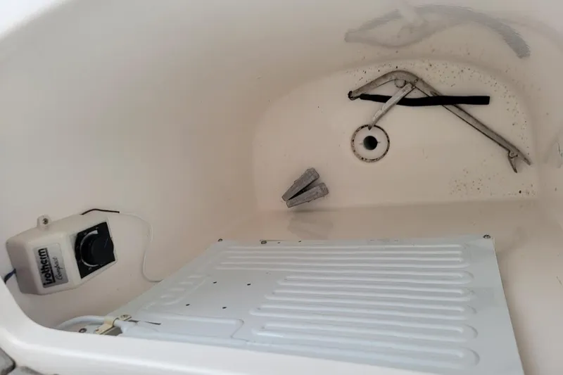  Yacht Photos Pics Interior view of 2010 Intrepid 39 Kevlar Hull yacht storage compartment.