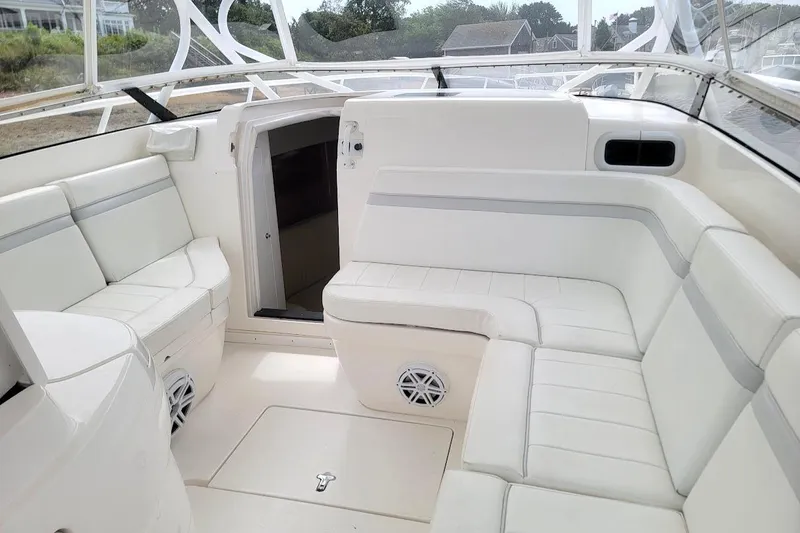  Yacht Photos Pics Luxurious white seating area on a 2010 Intrepid 39 Kevlar Hull sport yacht.