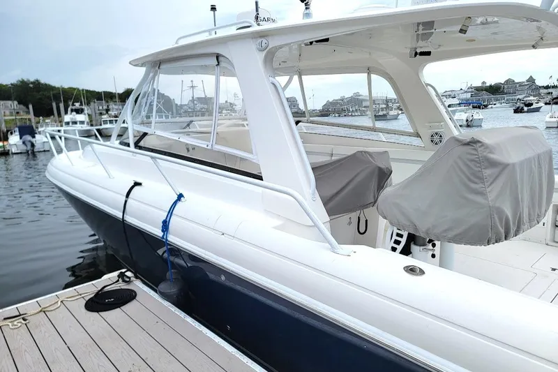  Yacht Photos Pics 2010 Intrepid 39 Kevlar Hull Sport Yacht docked at marina.