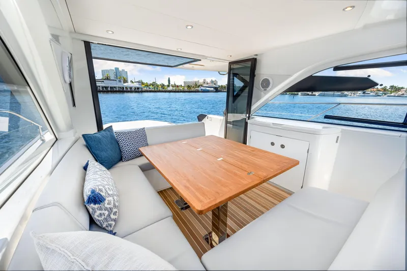  Yacht Photos Pics Luxurious interior of 2024 Beneteau Gran Turismo 45 yacht with waterfront view.