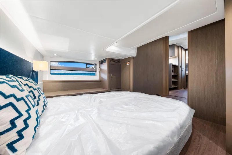  Yacht Photos Pics Luxurious cabin interior of 2024 Beneteau Gran Turismo 45 yacht, featuring modern design and comfort.