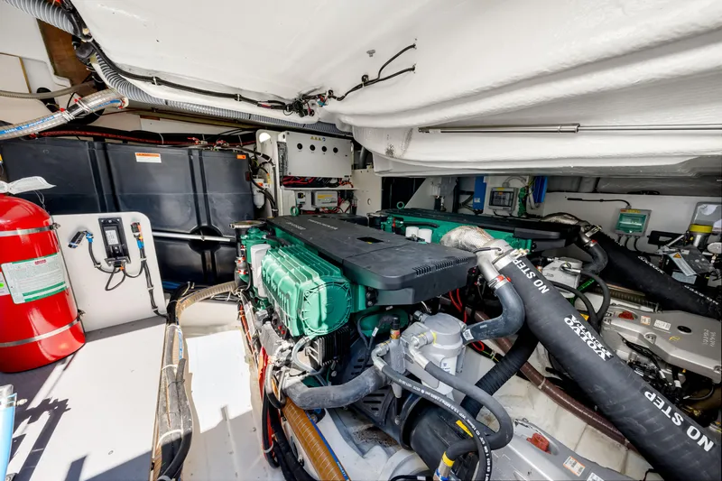  Yacht Photos Pics Engine room of 2024 Beneteau Gran Turismo 45 yacht, featuring modern equipment and fire safety system.