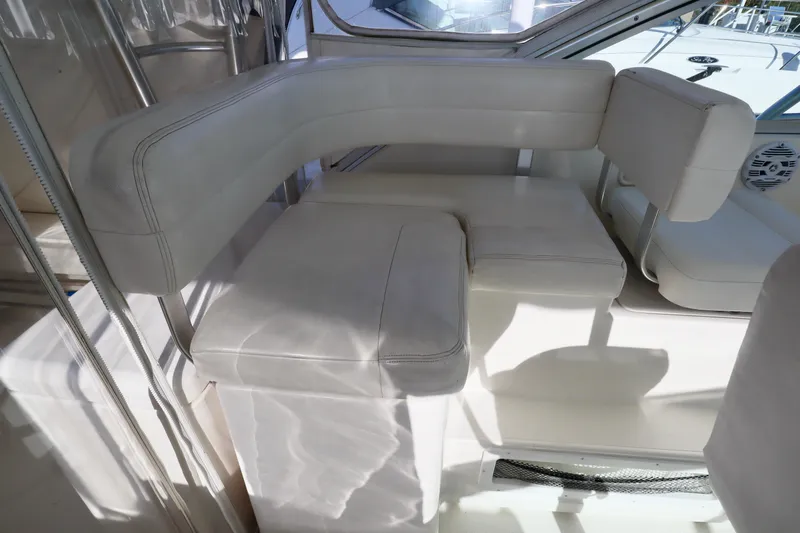  Yacht Photos Pics 2006 Rampage 33 Express boat interior with white cushioned seating.