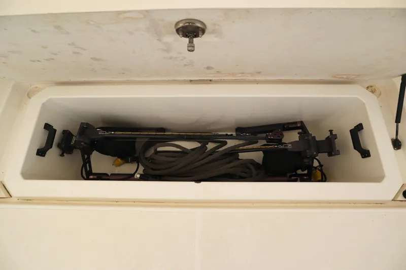  Yacht Photos Pics Storage compartment of 2006 Rampage 33 Express boat with equipment inside.