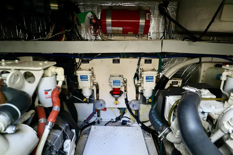  Yacht Photos Pics Engine room of 2006 Rampage 33 Express boat, showcasing mechanical components and systems.