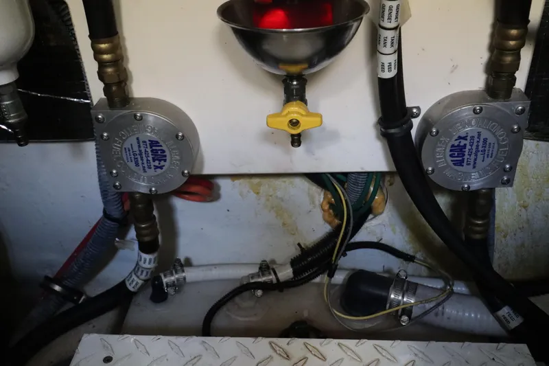  Yacht Photos Pics Engine room of 2006 Rampage 33 Express with fuel system components.