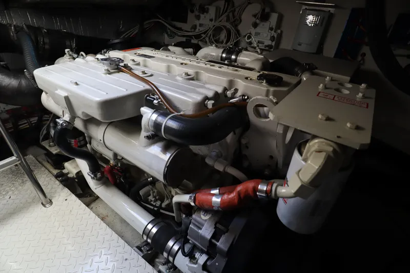  Yacht Photos Pics Engine room of 2006 Rampage 33 Express boat, showcasing detailed machinery components.