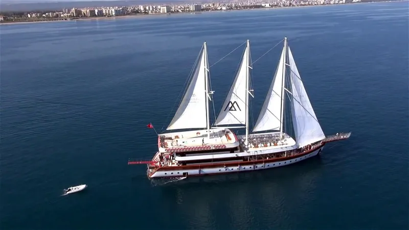 My Dream Yacht Photos Pics Aerial view of Custom Manavgat GT 457 sailboat, 2009 model, sailing near the coast.