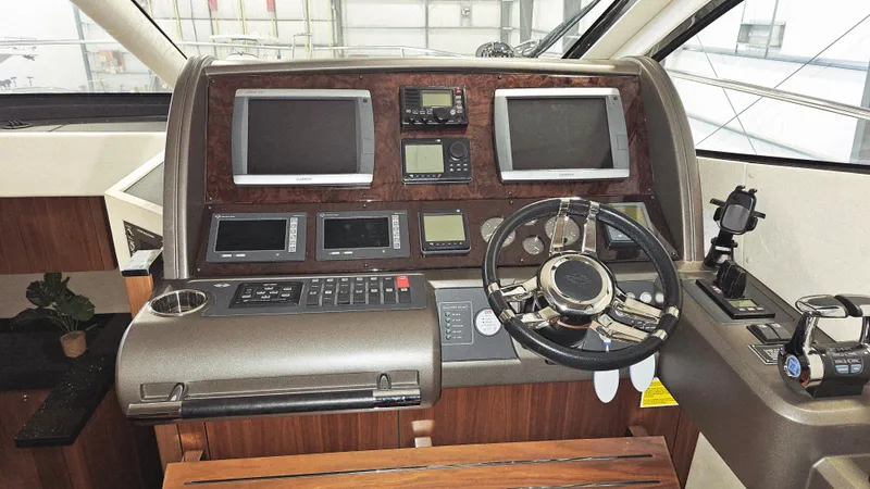 Far Niente Yacht Photos Pics Helm of 2012 Sunseeker Manhattan 53 yacht with advanced navigation systems and controls.