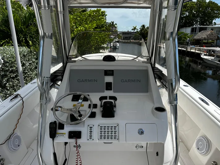  Yacht Photos Pics 2015 Intrepid 327i Open boat helm with Garmin navigation system