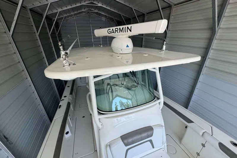 Yacht Photos Pics 2018 World Cat 320 CC boat with Garmin radar, stored in a metal shelter.