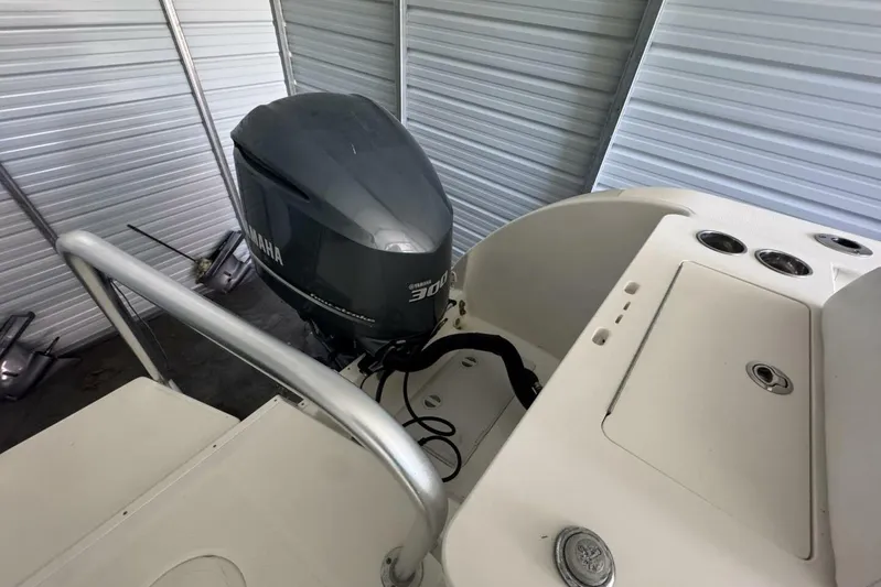  Yacht Photos Pics 2018 World Cat 320 CC boat with Yamaha 300 outboard engine in storage.