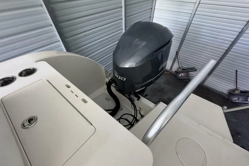  Yacht Photos Pics 2018 World Cat 320 CC boat with Yamaha outboard motor in storage.