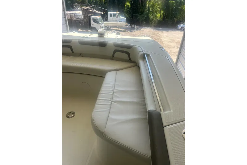  Yacht Photos Pics Interior view of 2018 World Cat 320 CC boat with cushioned seating.