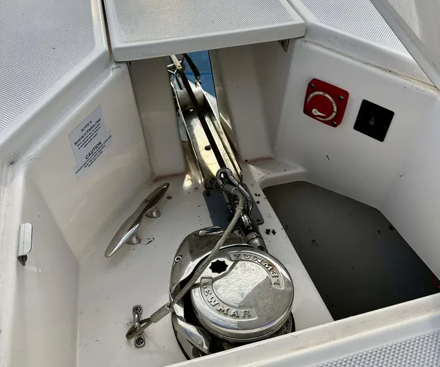  Yacht Photos Pics Anchor compartment of 2021 Regal 38 SAV boat with winch and chain.