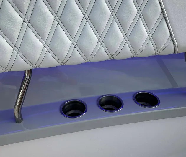  Yacht Photos Pics 2021 Regal 38 SAV boat interior with quilted seating and cup holders.