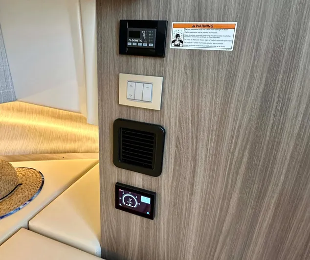  Yacht Photos Pics Control panel and switches inside 2021 Regal 38 SAV boat cabin.