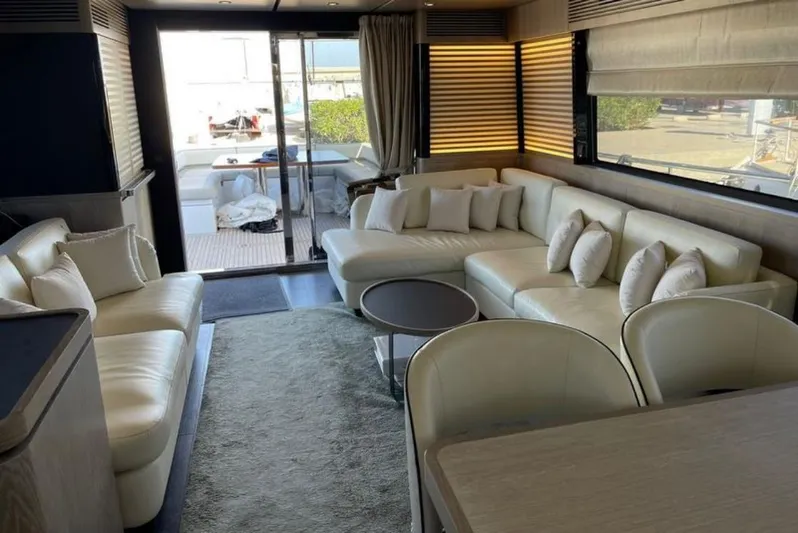  Yacht Photos Pics Luxurious interior of 2019 Azimut Magellano 66 yacht with elegant seating and modern decor.