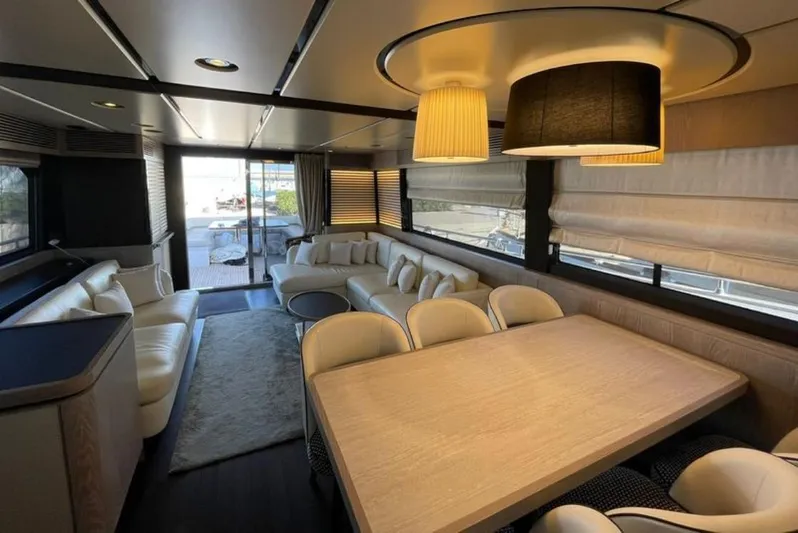  Yacht Photos Pics Luxurious interior of 2019 Azimut Magellano 66 yacht with elegant seating and dining area.