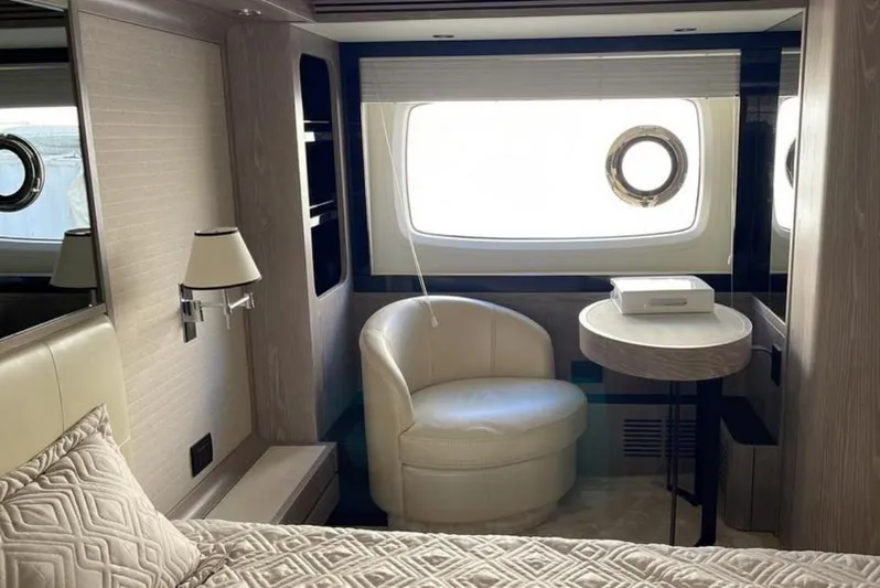  Yacht Photos Pics Luxurious cabin interior of 2019 Azimut Magellano 66 yacht with elegant furnishings.