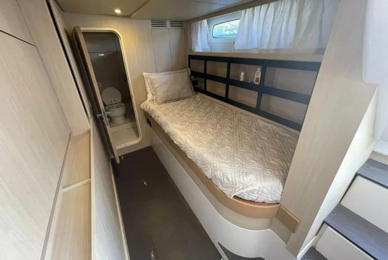  Yacht Photos Pics 2019 Azimut Magellano 66 cabin with single bed and ensuite bathroom.