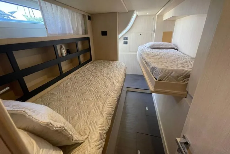  Yacht Photos Pics Cabin interior of 2019 Azimut Magellano 66 yacht with twin beds.