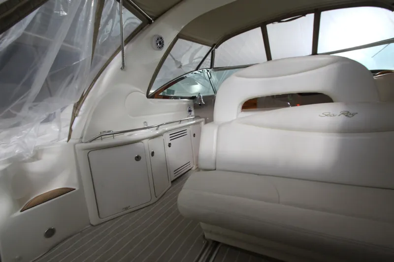  Yacht Photos Pics Interior of a 2000 Sea Ray 410 Sundancer yacht with white seating and cabinetry.