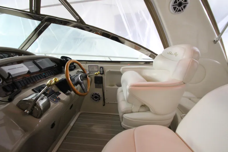  Yacht Photos Pics Cockpit of 2000 Sea Ray 410 Sundancer with steering wheel and controls.