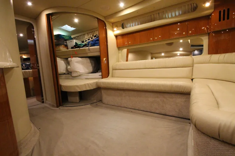  Yacht Photos Pics Luxurious interior of 2000 Sea Ray 410 Sundancer yacht with plush seating and elegant design.