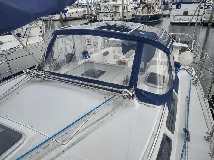 Bluebird Yacht Photos Pics 2002 Catalina 36 MkII sailboat docked in marina, featuring blue canvas and rigging.