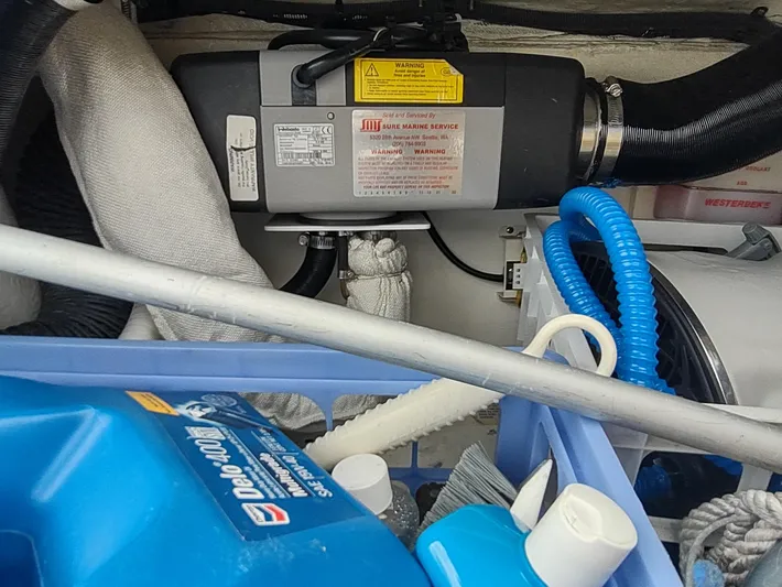 Bluebird Yacht Photos Pics Engine compartment of a 2002 Catalina 36 MkII with maintenance supplies and equipment.