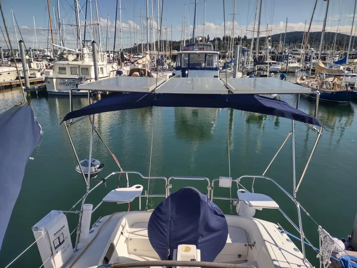 Bluebird Yacht Photos Pics Catalina 36 MkII sailboat, 2002 model, docked in a marina with solar panels.