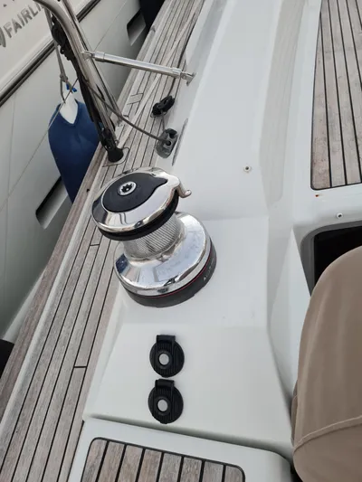  Yacht Photos Pics 2015 Jeanneau 57 yacht deck with winch and teak finish.